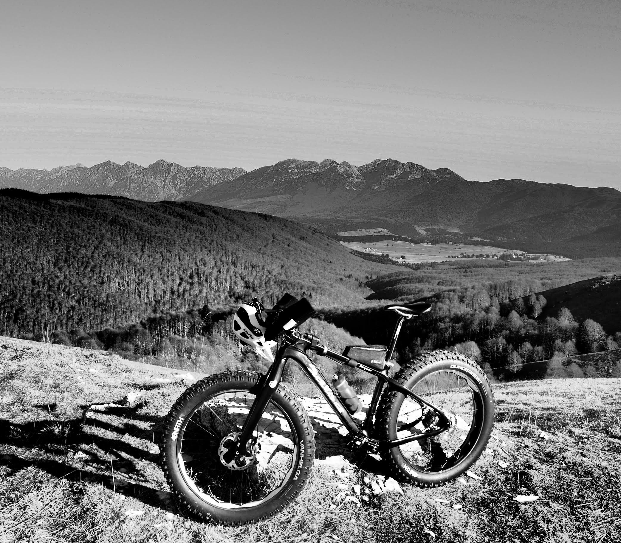 B&W image of a Salsa Beargrease at the summit of Monte Pizzoc, in the Italian prealps in the Veneto region.