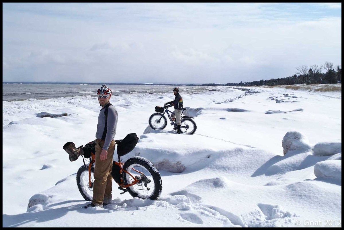 fatbikes on a snowy shoreline
