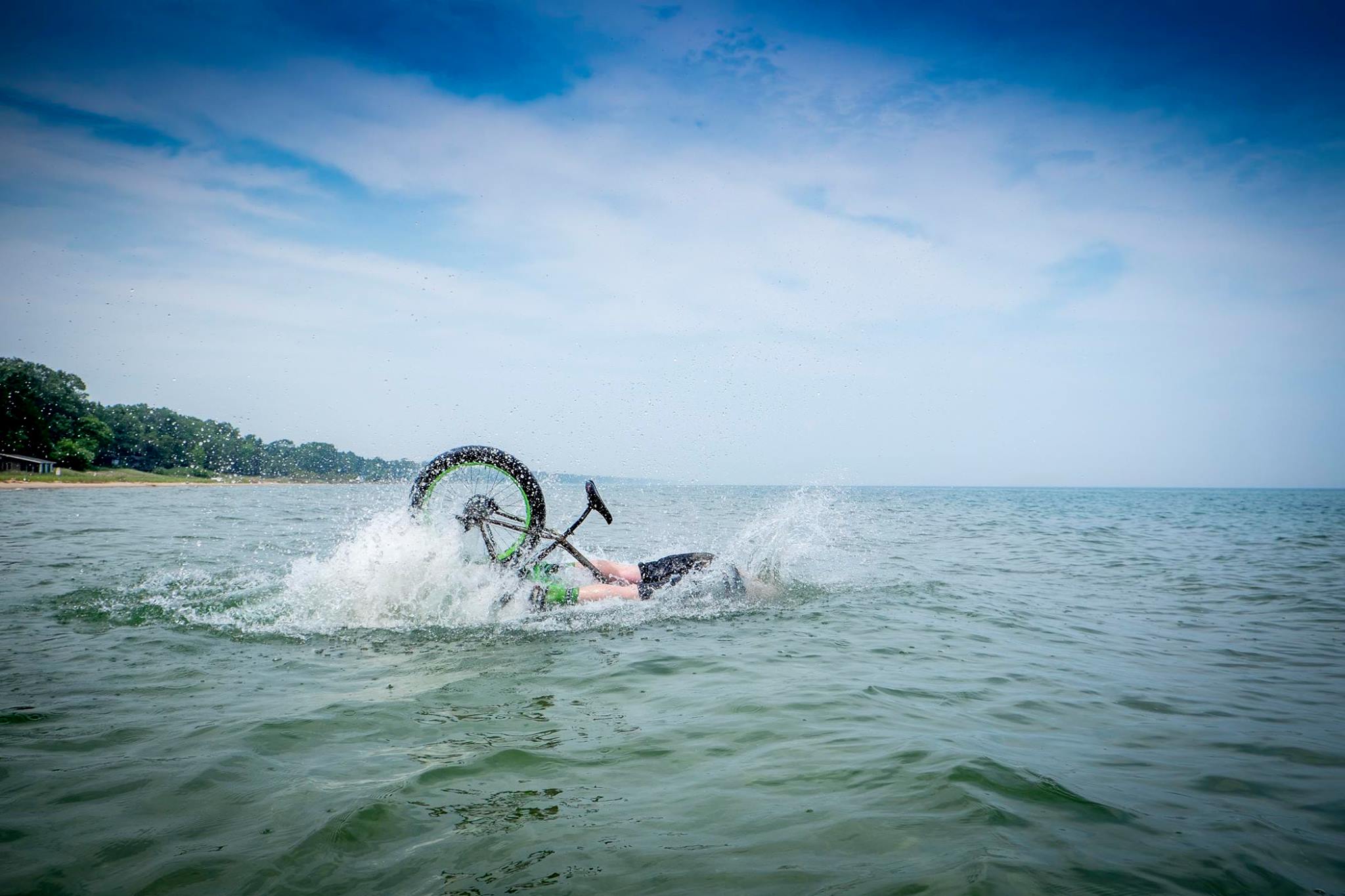 man on fat bike falls into Lake Michigan after jumping off pier